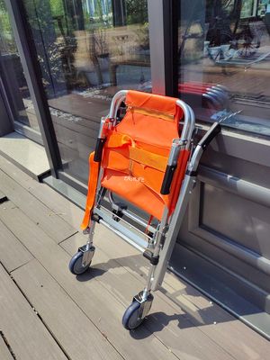 Four Wheel Aluminum Alloy Staircase Stretcher Foldable PVC Fabric For Emergency Patient Transfer